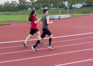 Dr.'s John G and Jon S. working on their 400m dash